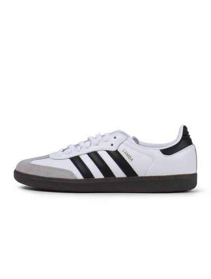 Adidas Samba OG sneaker in white with black stripes, suede toe, and dark gum sole.